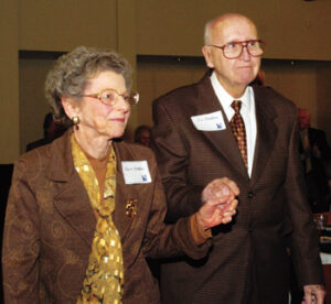 The Needham's on their way up to the podium to receive the Arnold award.